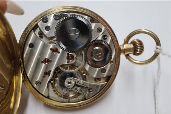 A 9ct gold open face pocket watch with Arabic numerals and subsidiary seconds.